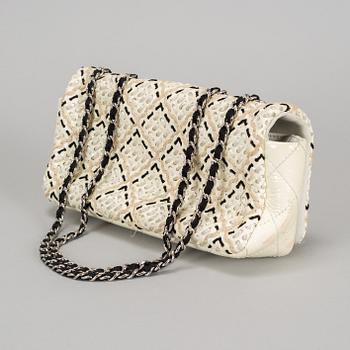 A white Chanel bag, 2010-2011.