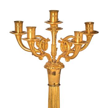 A French late Empire gilded six-light candelabra, mid 19th century.