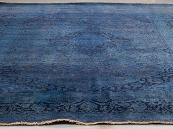 An oriental carpet, ca 408 x 299 cm.