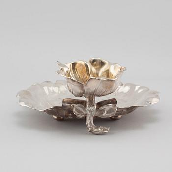 A silvered metal serving dish, early 20th century.