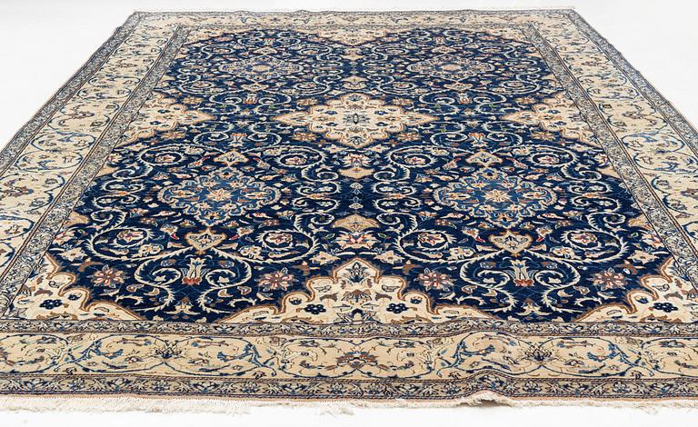 A carpet, possibly Yasd, c. 459 x 309 cm.