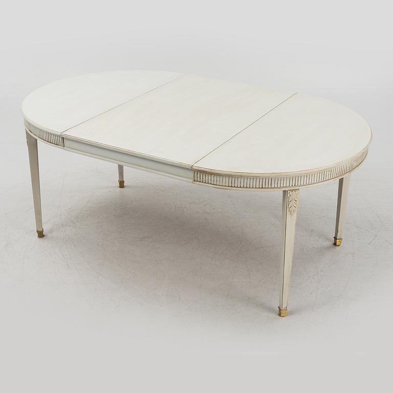 A Gustavian style dining table, mid 20th century.