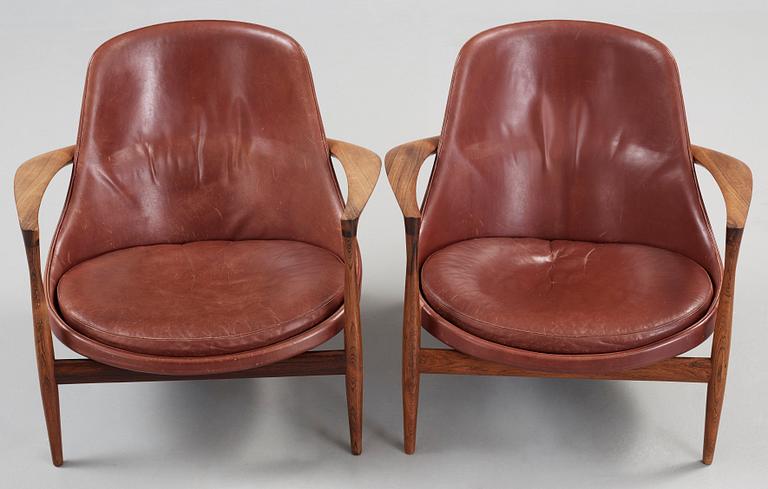 A pair of Ib Kofod Larsen palisander and brown leather 'Elisabeth' easy chairs, Denmark 1950's-60's.