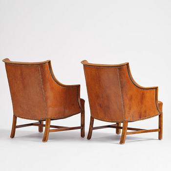 Frits Henningsen, a pair of armchairs, mid-20th century.