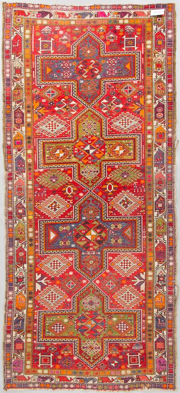 A rug presumably from Karabagh, around 1900. Ca. 305 x 137 cm.