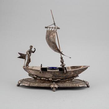A silver plated inkwell, circa 1900.
