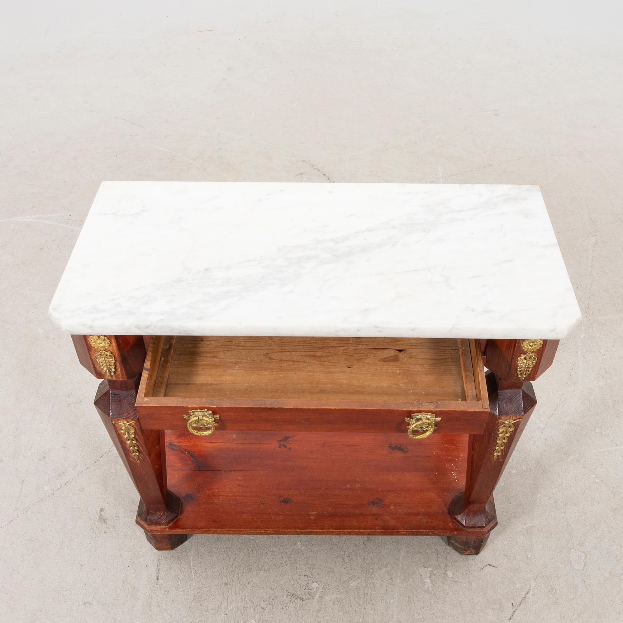 An empire style console table first half of the 20th century.
