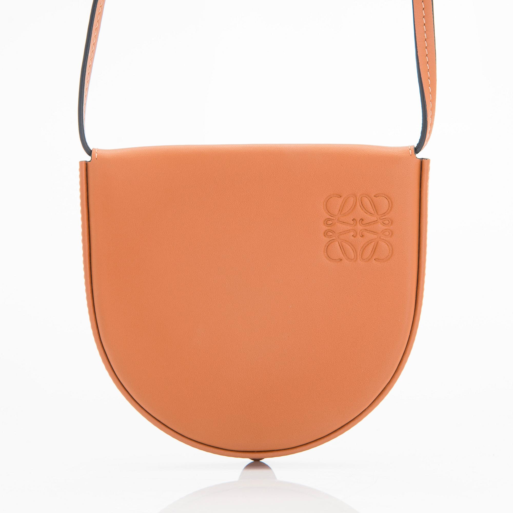 Loewe, a 'Small Heel Pouch' bag.