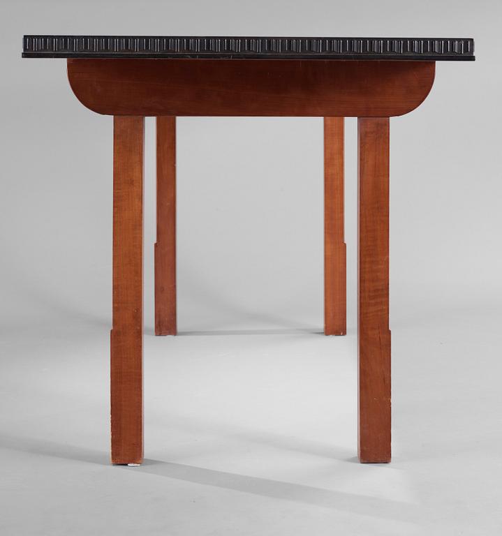 A Hjalmar Jackson ebony and pear wood desk / library table, Stockholm 1934, possibly designed by Oscar Nilsson.