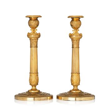 A pair of French Empire candlesticks, early 19th century.