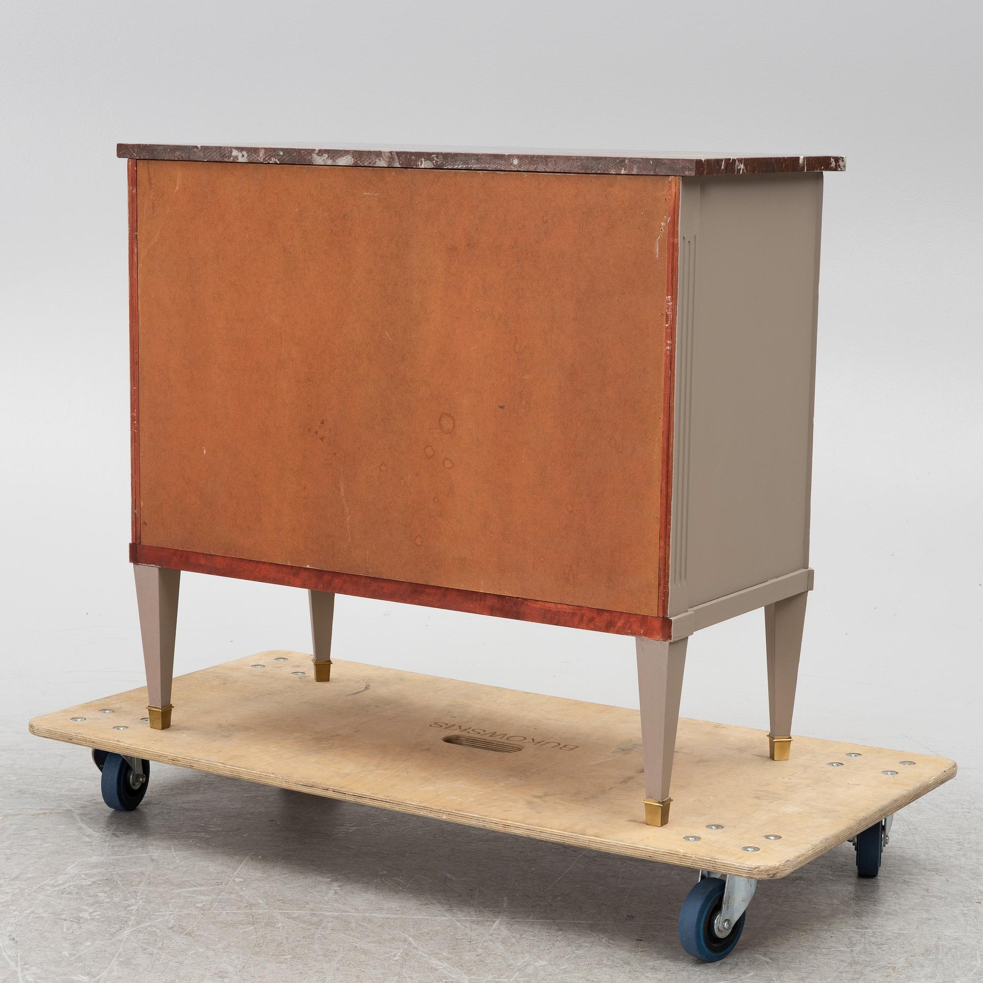 A Gustavian style chest of drawers, Mid 20th Century.