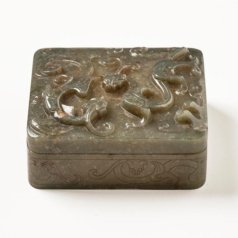 A well carved green stone box with cover, China, 20th century.