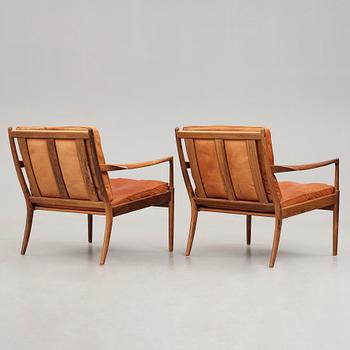 Ib Kofod-Larsen, a pair of "Samsö" palisander and brown leather easy chairs, Olof Persons Fåtöljindustri (OPE) Sweden 1960's.
