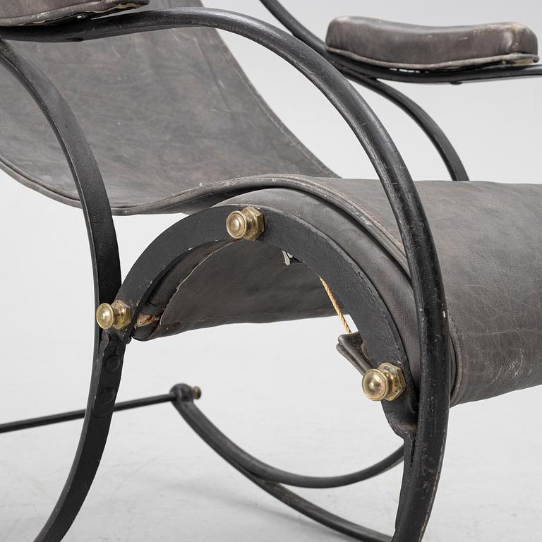 An iron rocking chair, R.W Winfeild & Company, England, late 19th century.