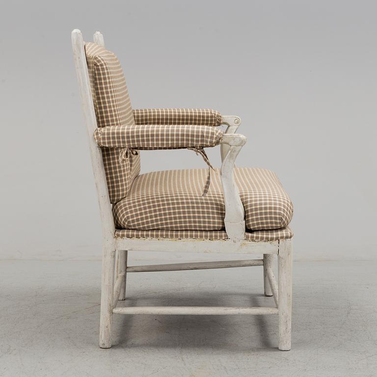 A painted armchair from around year 1800.