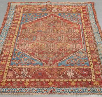 MATTO, an antique Anatolian, the Ottoman Empire, ca 154,5-158 x 99,5-102,5 cm (as well as 1 cm flat weave at one end).