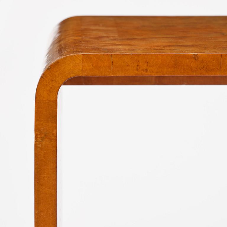 Swedish Modern, a birch veneered coffee table, 1930s-40s.