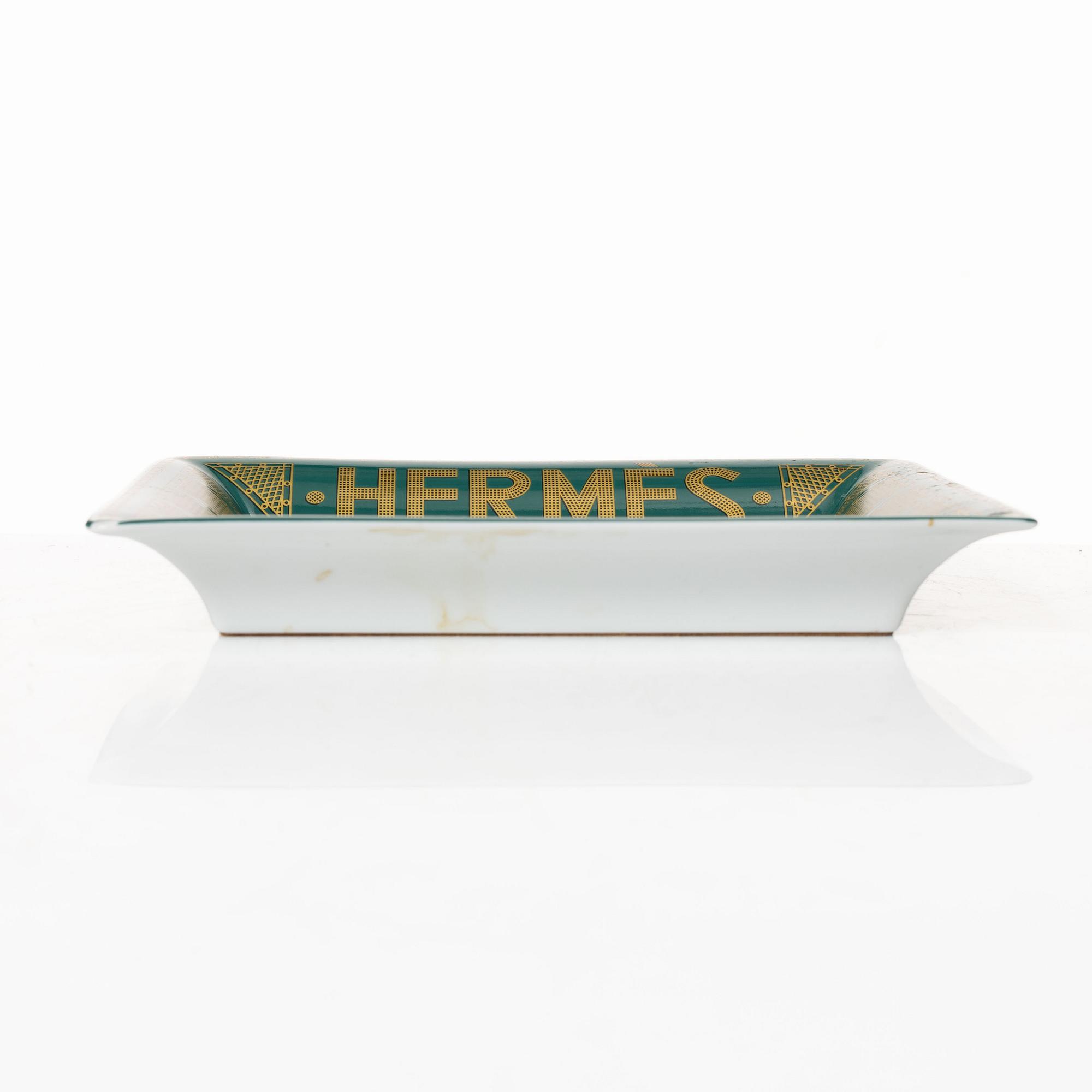 Hermès, a porcelain change tray, "Sellier".