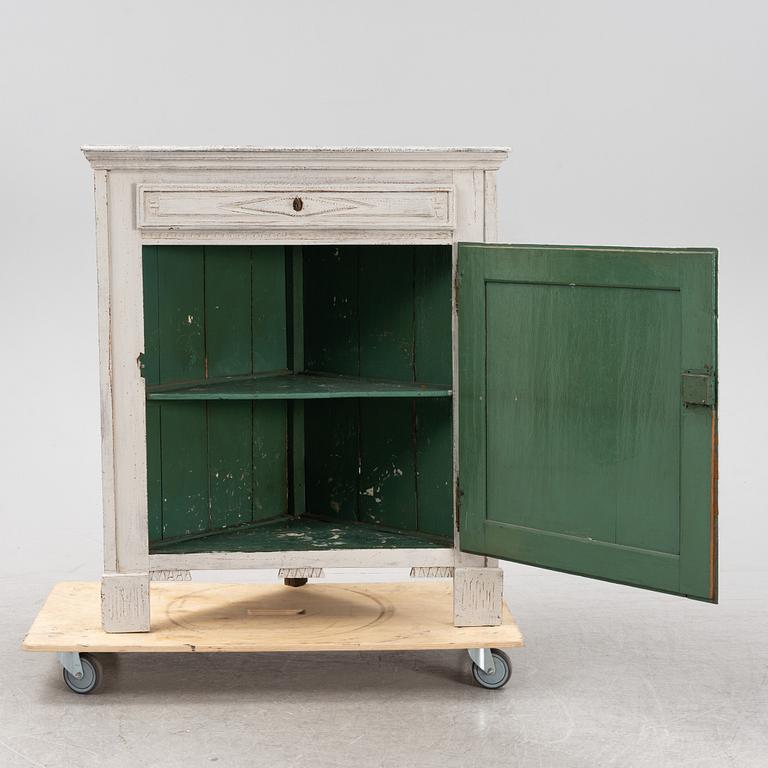 A 19th Century painted corner cabinet.