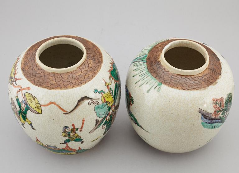 Two Chinese famille verte jars with wooden covers, first half of the 20th century.