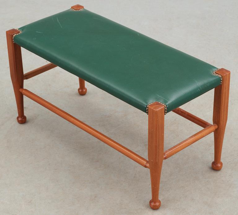 A Josef Frank mahogany and green leather bench, Svenskt Tenn, model 2009.