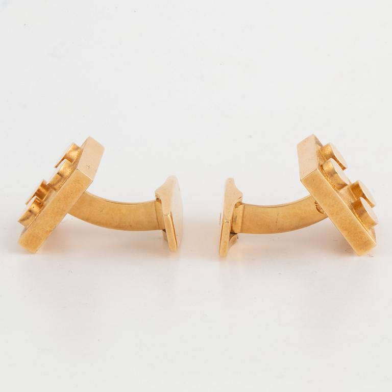 Lego 14K gold cufflinks.