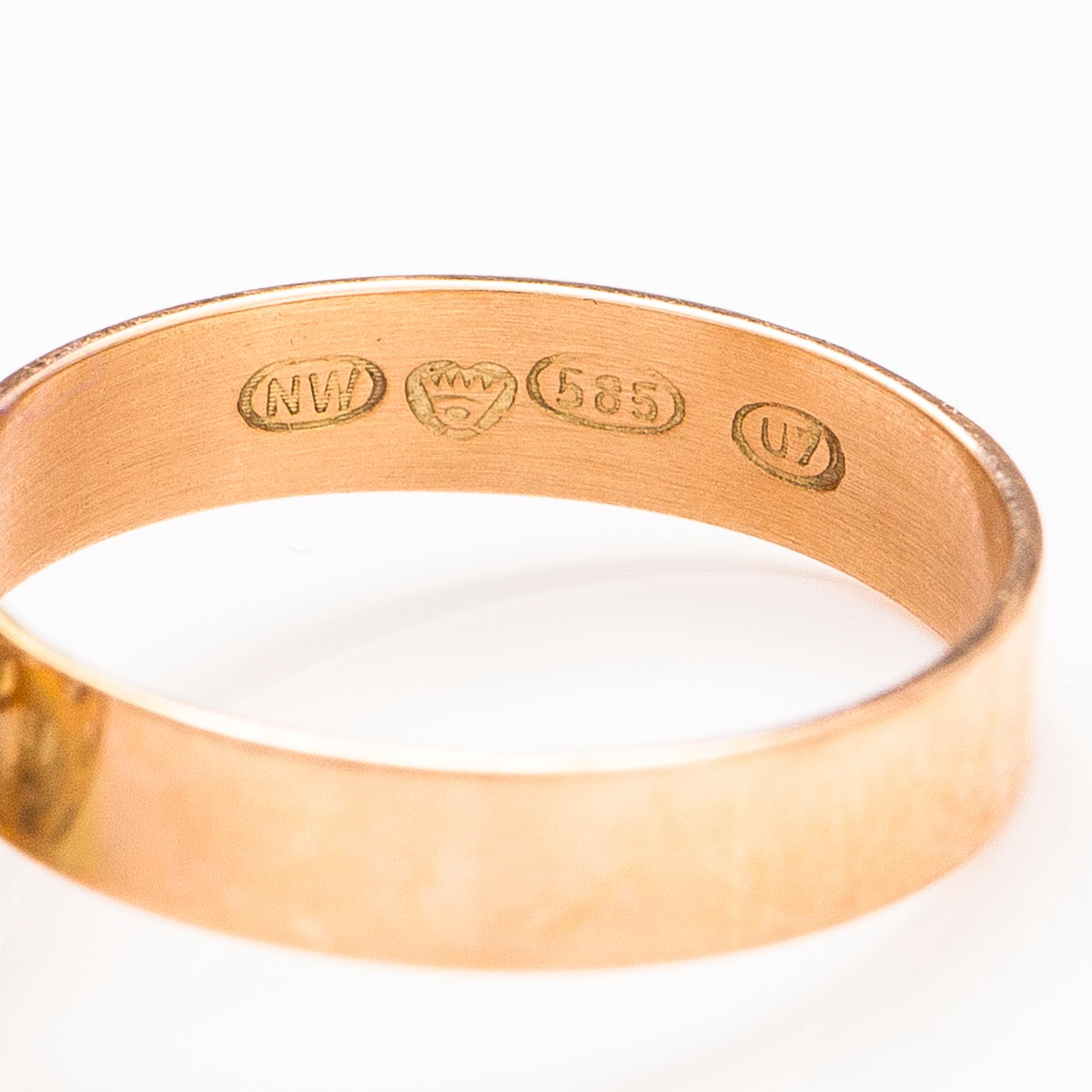 LIISA VITALI, A 14K gold ring and pendant "Leppäkerttu". Westerback, Helsinki 1973.