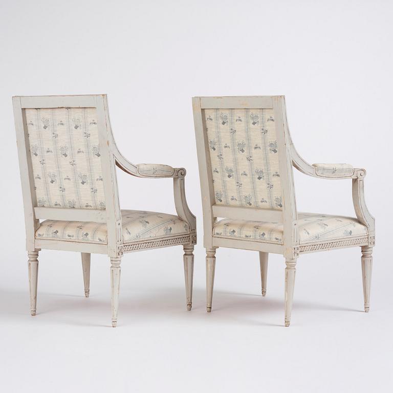 A pair of Gustavian open armchairs by J. Lindgren (master in Stockholm 1770-1800).