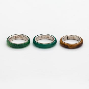 A set of three sterling silver rings, two with chalcedony and one with tiger's eye. Kultakeskus, Hämeenlinna.