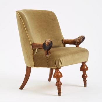 Swedish designer, a stained and carved birch folkart chair, ca 1900.