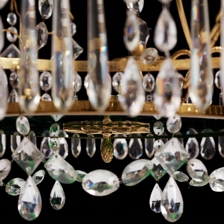 A German Louis XVI ormolu and cut-glass nine-light chandelier attributed to Johann Christoph Ermisch, late 18th century.