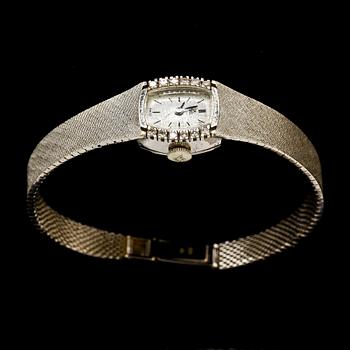 DAMARMBANDSUR, EBEL, 18k vitguld med 12 åttkantslipade diamanter. Vikt 29 g.