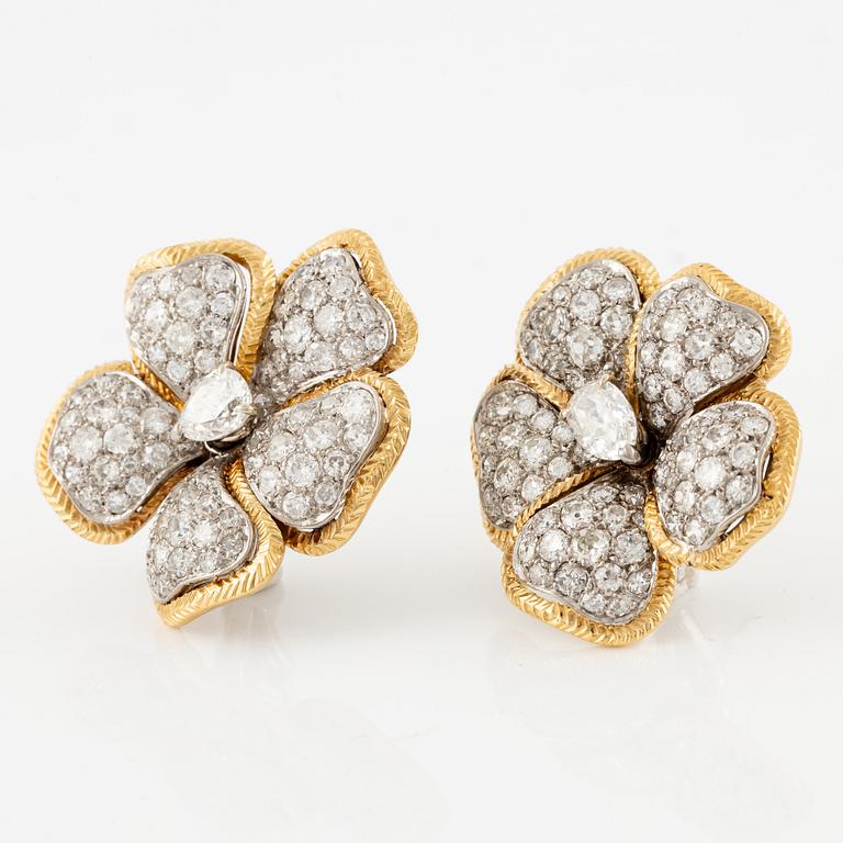 A pair of earrings in 18K gold and white gold set with old-, round brilliant and eight-cut diamonds.
