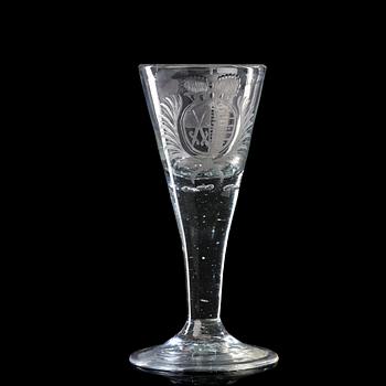 234. A German armorial wine glass, 18th Century.