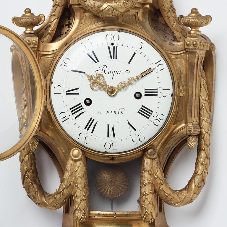 A Louis XVI gilt bronze wall clock by Jean Joseph Léonard Roque, active 1770-89.