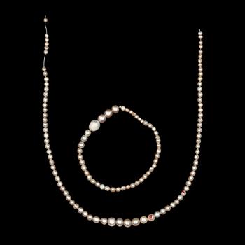 911. PEARLS, natural, bought in China in 1920. Not strung.