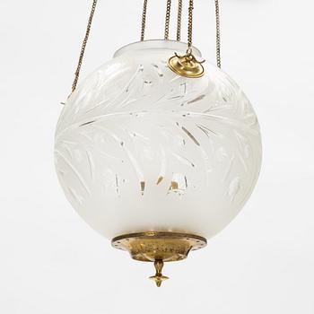 A brass and glass paraffin lamp, early 20th Century.