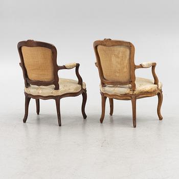 A Pair of Louis XV Beechwood Armchairs, 18th Century.