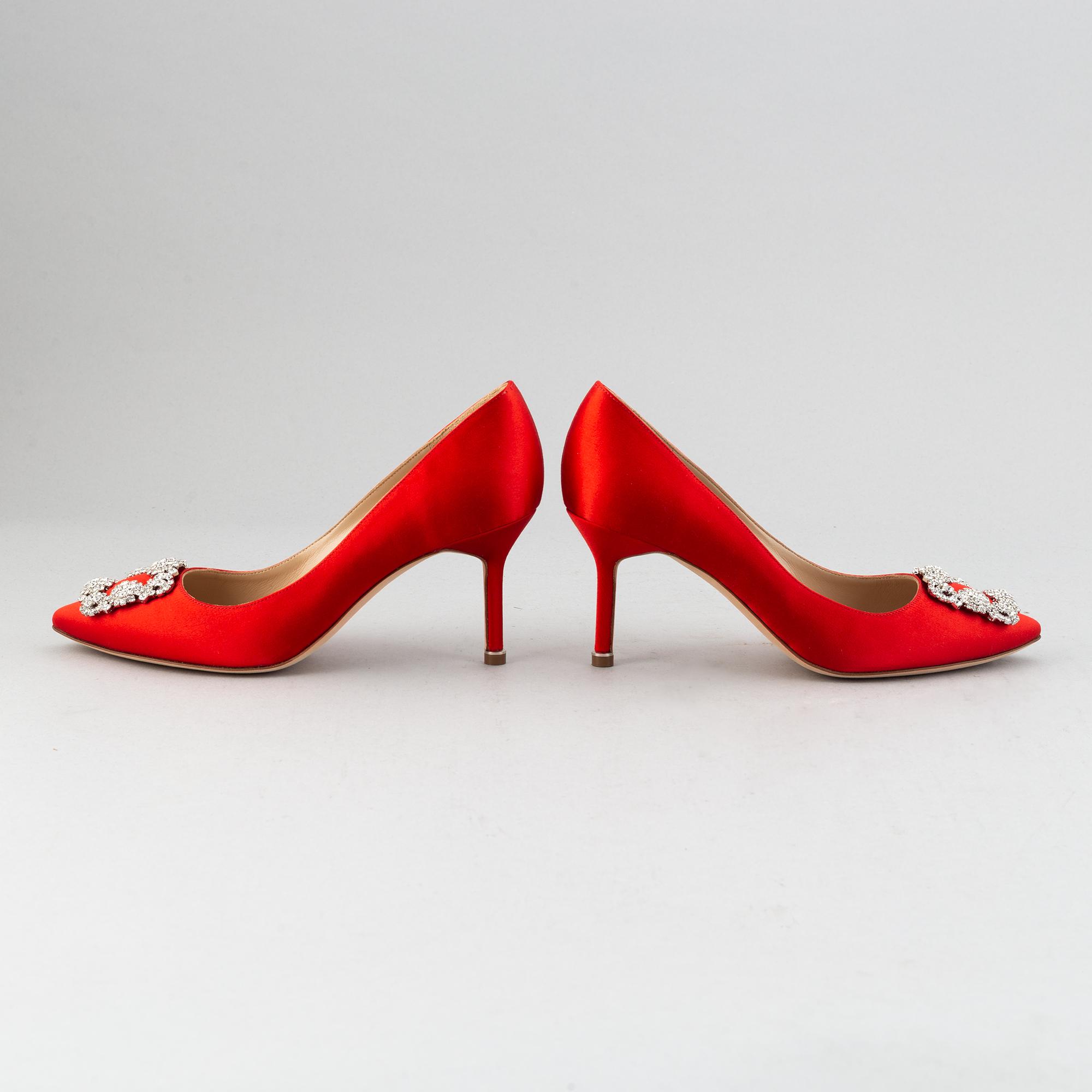 Manolo Blahnik, a pair of red satin 'Hangisi' shoes, 2020, size 38½.