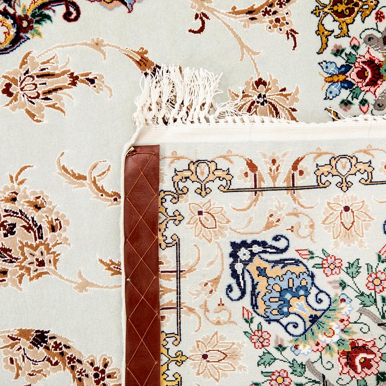 An old isfahan carpet part silk signed approx 222x148 cm.