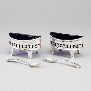 A pair of silver salt cellars, mark of H.