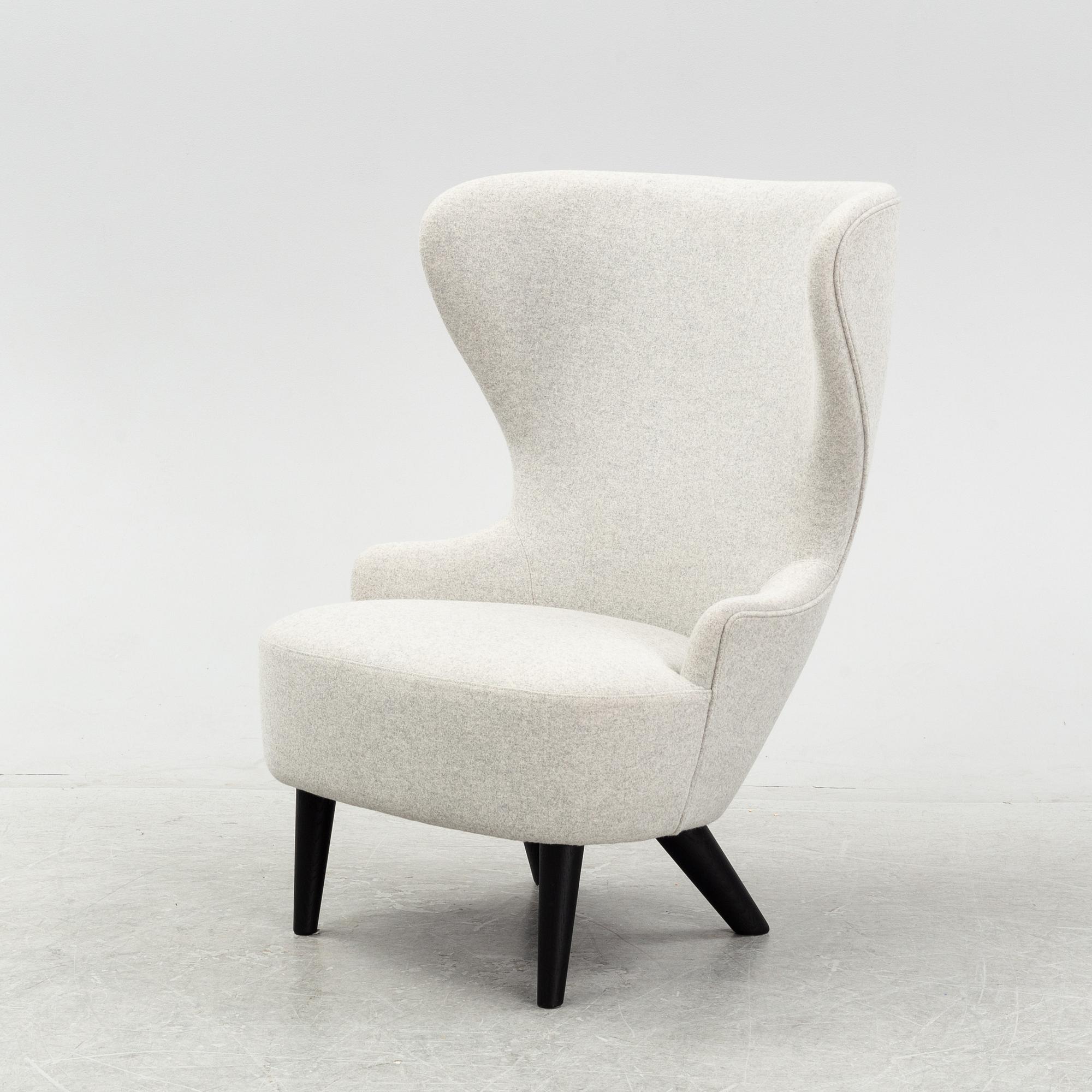 A 'Wingback Micro' easy chair by Tom Dixon.