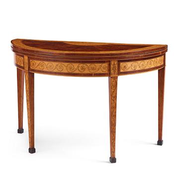 A Russian Louis XVI mahogany and birch parquetry demi-lune games table, late 18th century.