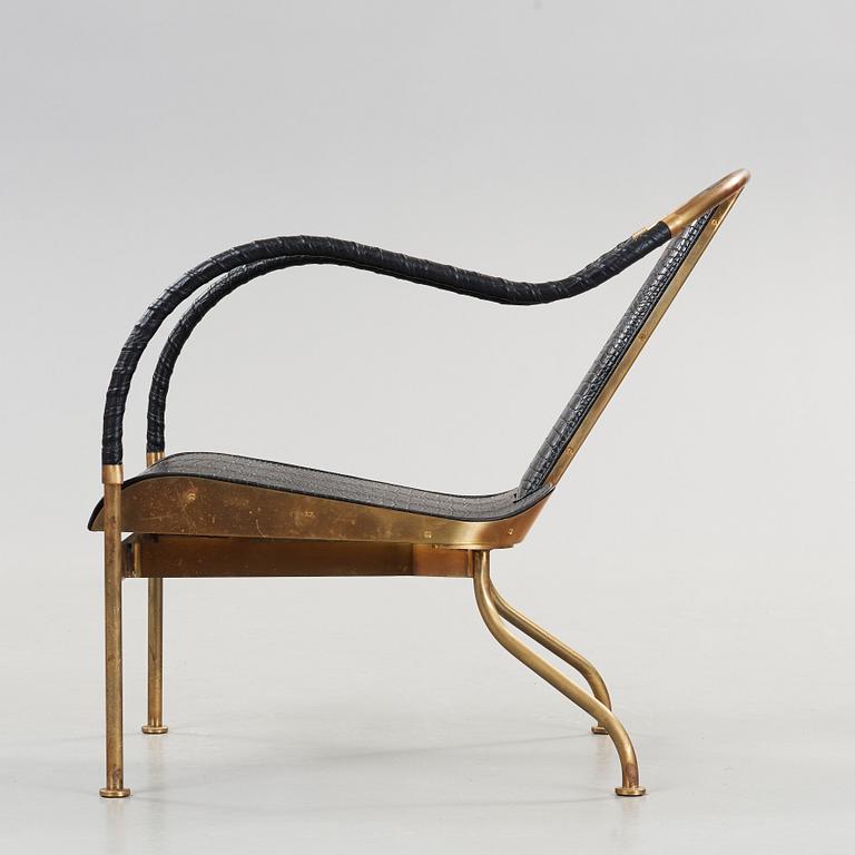 Mats Theselius, an 'El Rey' brass and leather easy chair, Källemo, Sweden.