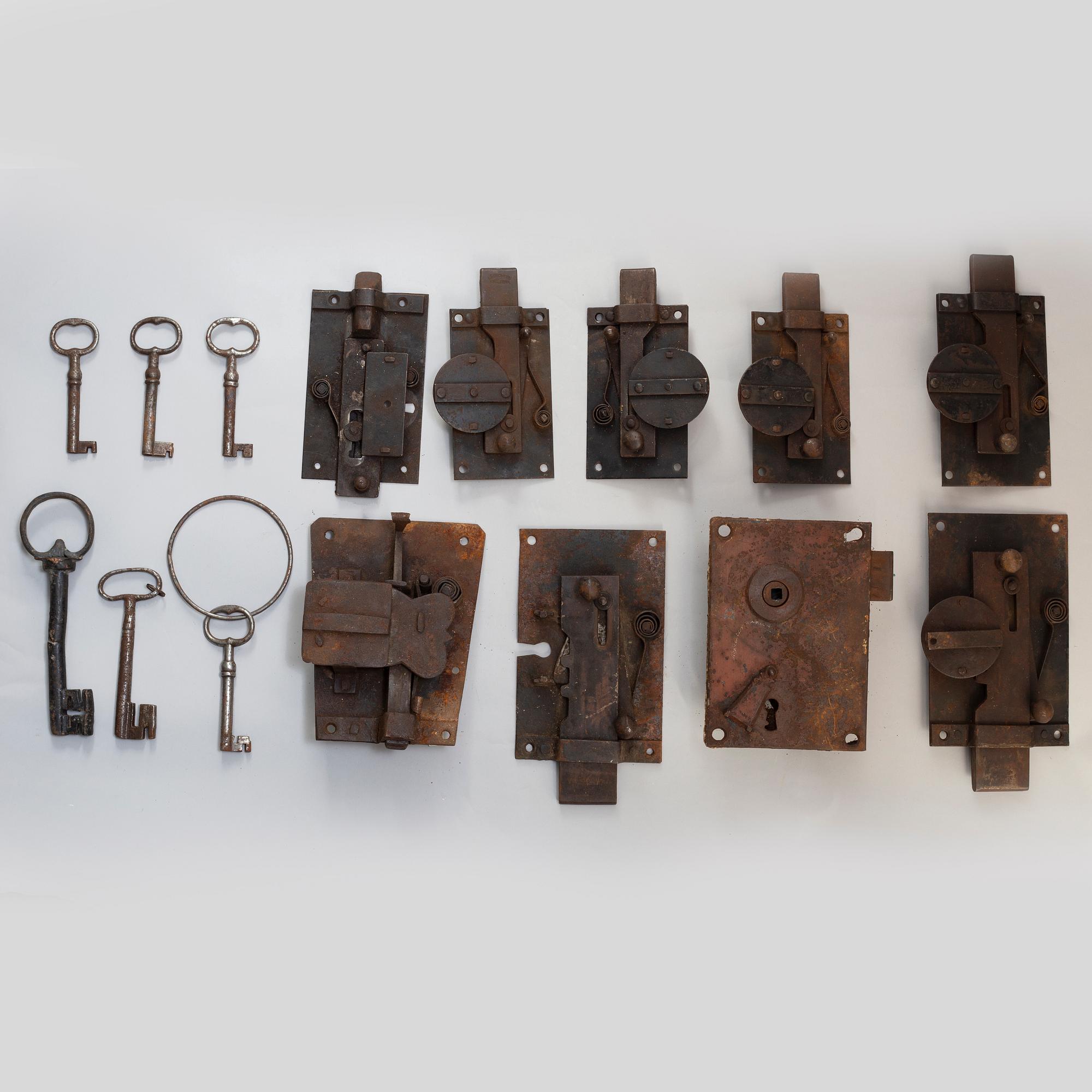 A set of nine cast iron locks, 19th century.