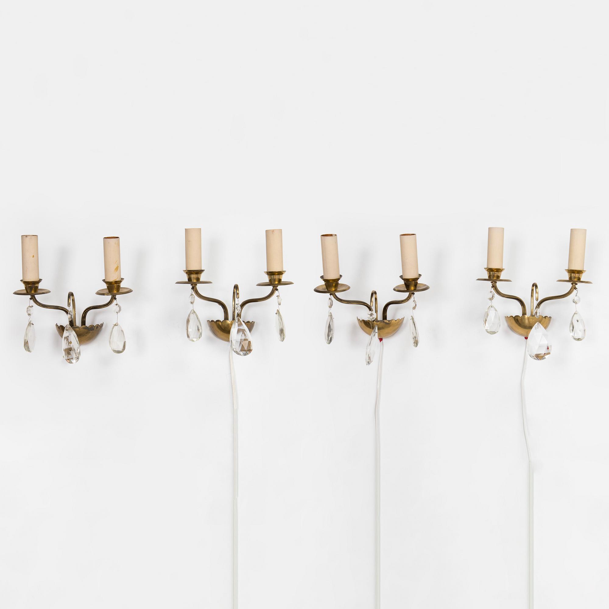 Four of mid-20th century wall sconces.
