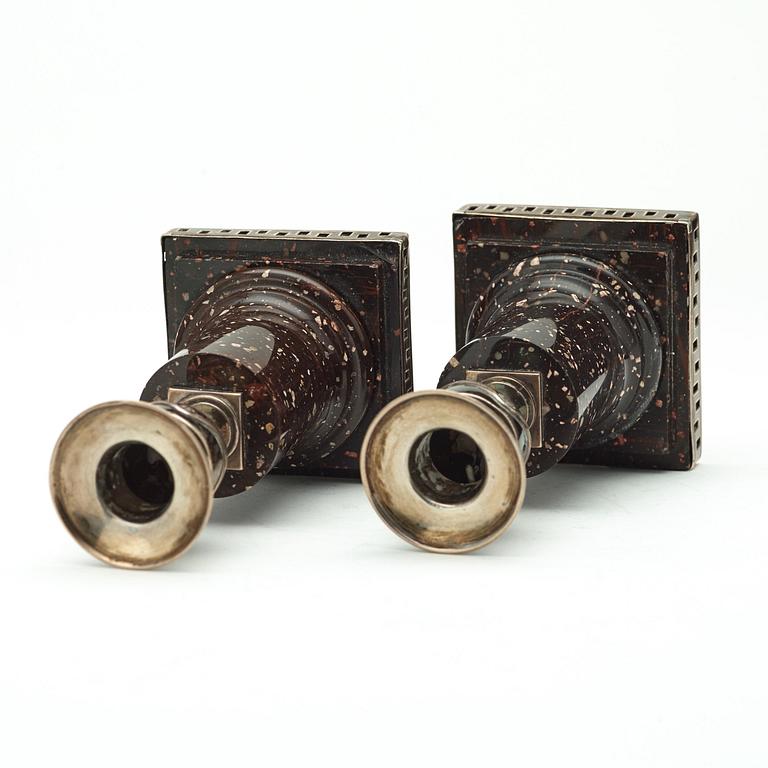 A pair of porphyry and silver candlesticks by Anders Christian Levon, Åbo 1799.