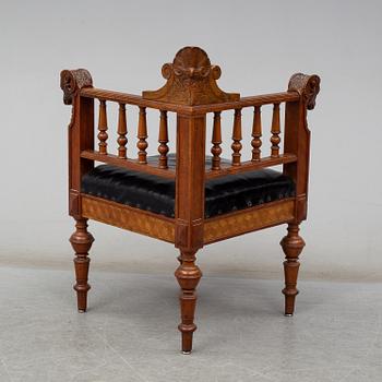 A late 19th century writing desk and armchair.