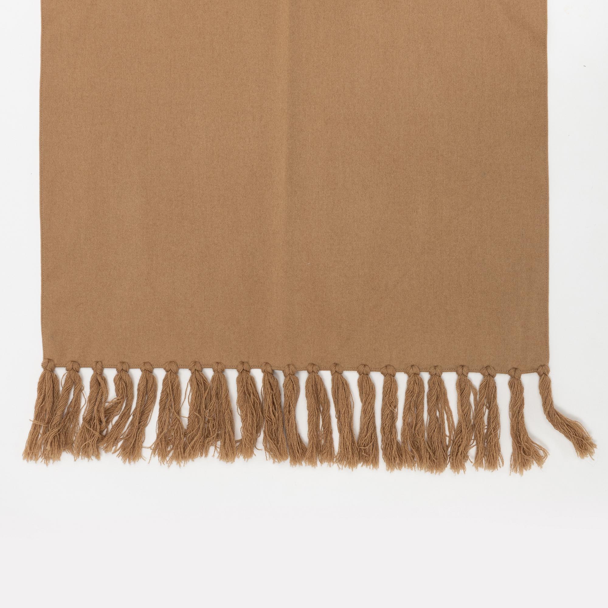Giorgio Armani, a beige camel's hair scarf.