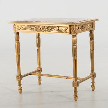 A Louis XVI-style table, first half of the 20th century.